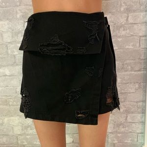 Black LF mini skort. Fits like a 0/XS.
